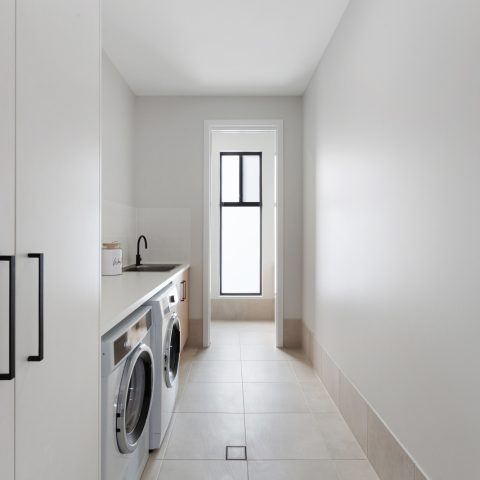 Laundry in pole frame home