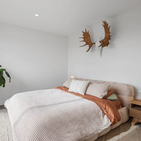 Bedroom in brick home